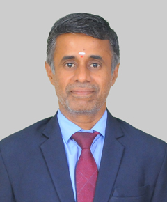 K. Ramesh, M.C.S., M.Phil., M.B.A., M.Com., Ph.D., SLET,